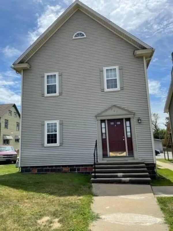 Grey siding house with red door exterior at Clarion Student Housing in Clarion Student Accommodation