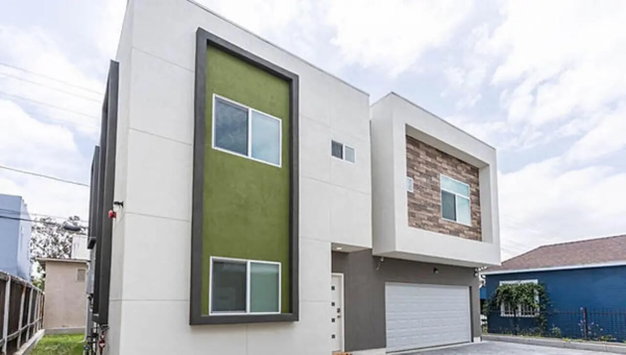 Modern building green accent garage and windows exterior at Affordable SoCal Living in Los Angeles Student Accommodation