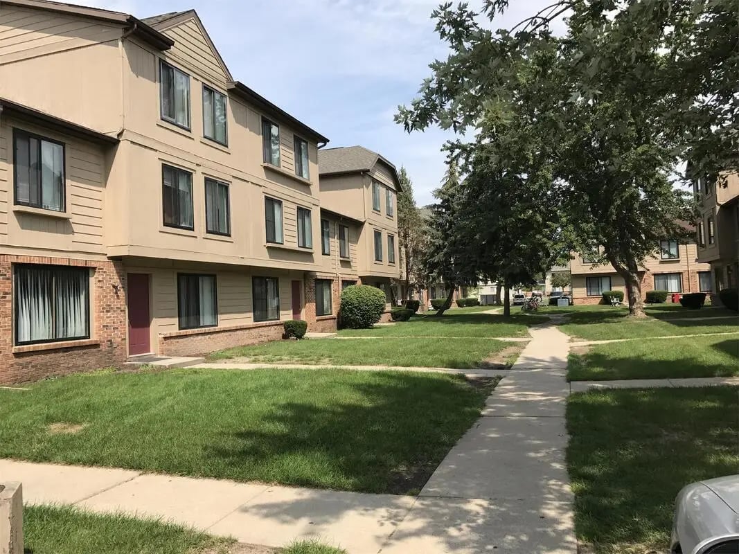 Apartment buildings with grassy yards exterior at Chip Village in Mount Pleasant Student Accommodation