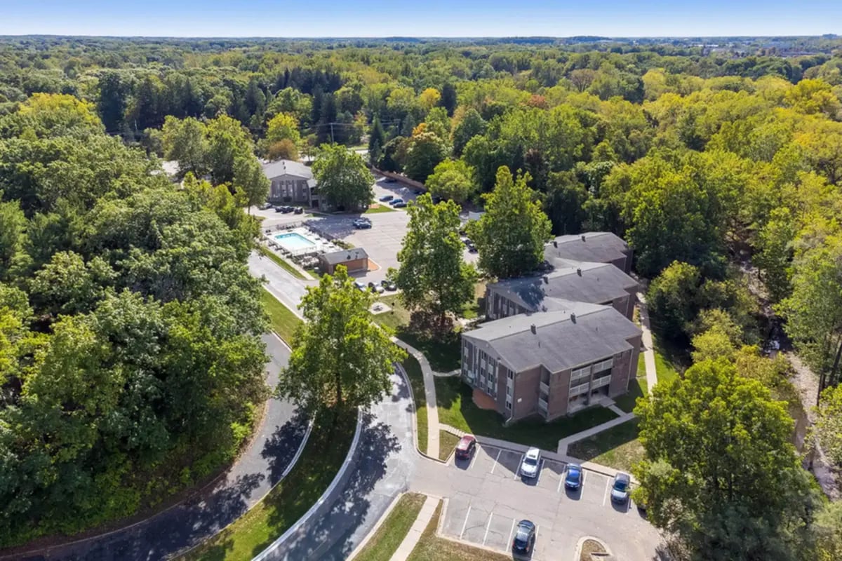 Apartment buildings pool parking lot exterior at Campus Hill Apartments in Ithaca Student Accommodation
