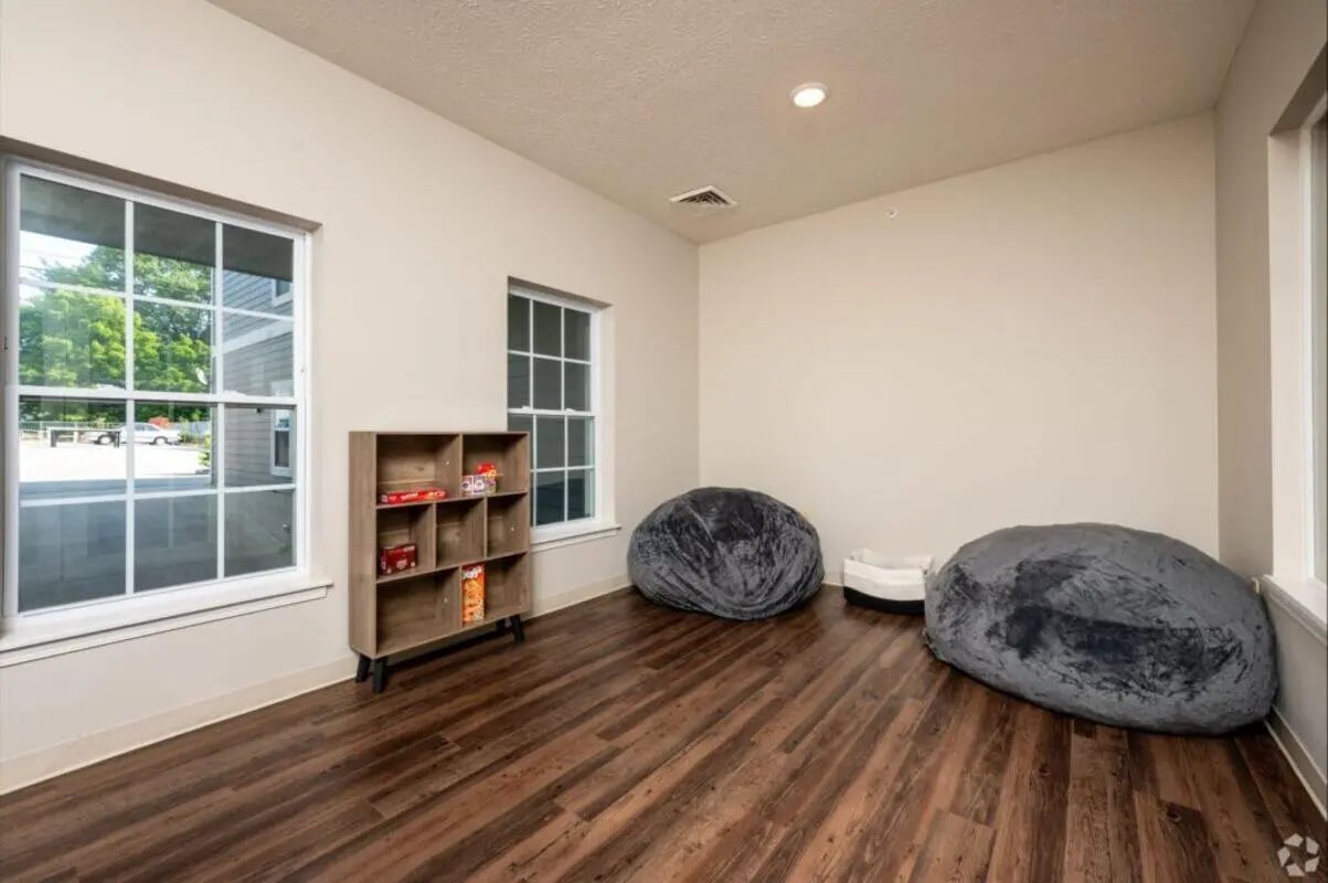 Beanbags and shelf with items lounge area at 120 Flats in West Lafayette Student Accommodation