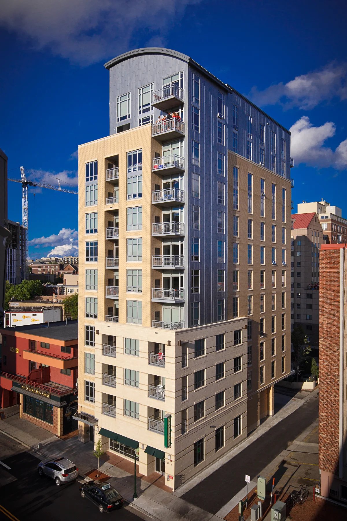 Modern apartment building with balconies exterior at City View Apartments in Madison Student Accommodation