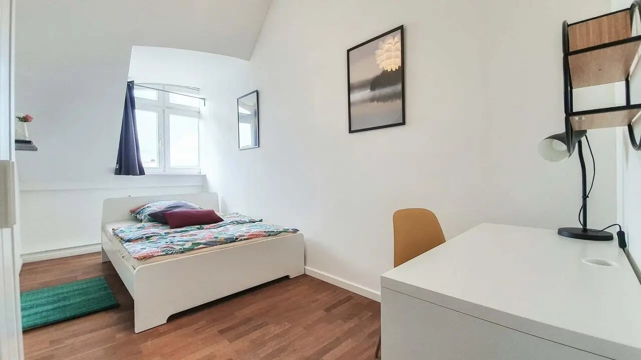 Bed desk chair lamp painting bedroom at Room in Martin-Luther-Str., 10777 Berlin, Germany in Berlin Student Accommodation