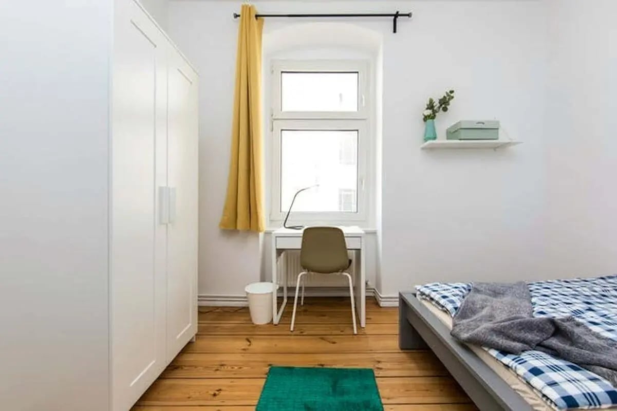 Wardrobe bed desk window study area bedroom at Room in Dominicusstraße, 10827 Berlin, Germany in Berlin Student Accommodation