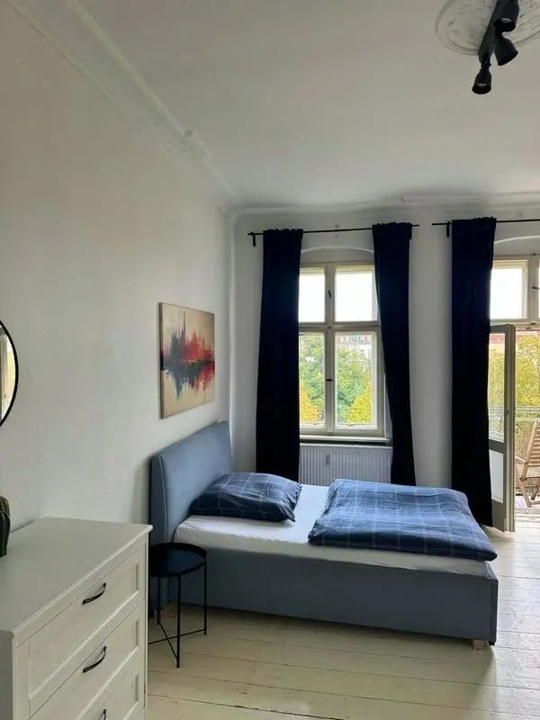 Bed chest of drawers painting bedroom at Room in Krossener Str., 10245 Berlin-Bezirk Friedrichshain-Kreuzberg, Germany in Berlin Student Accommodation
