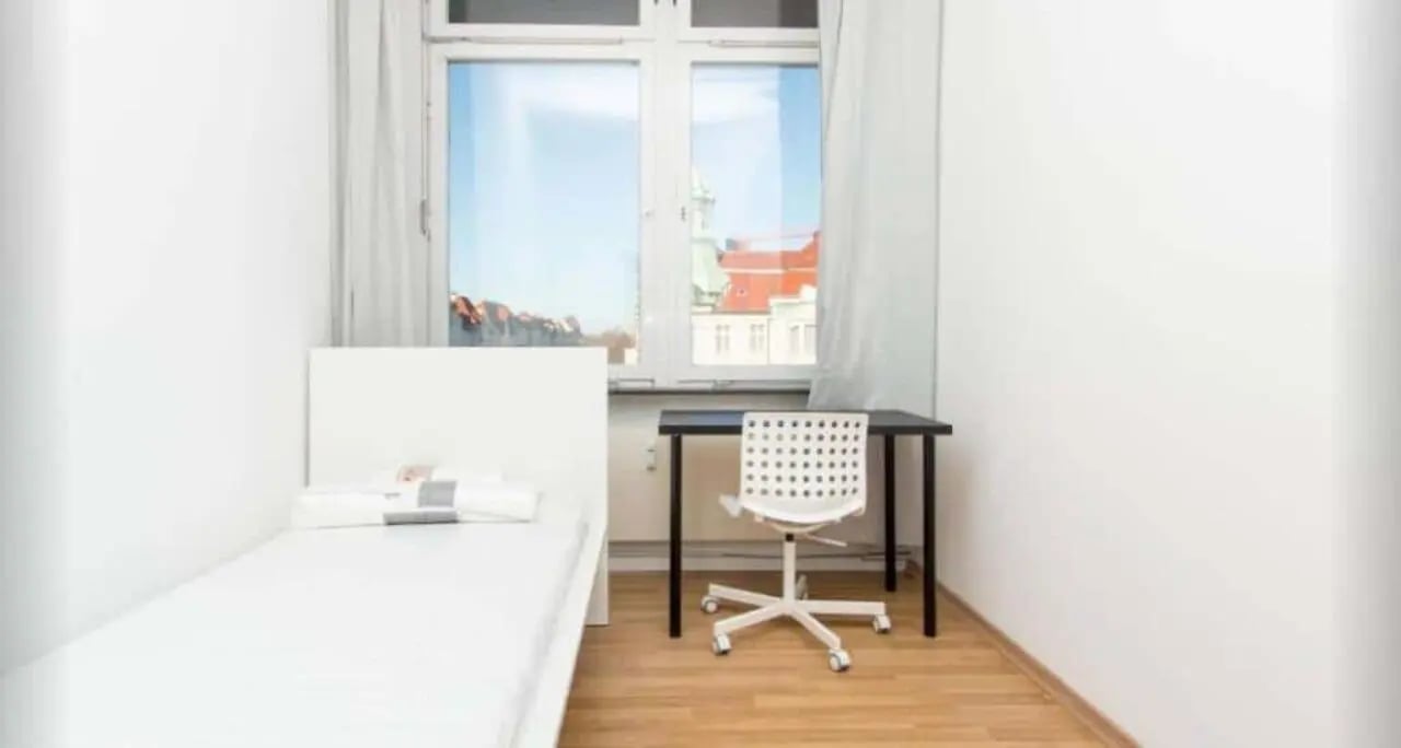 Bed desk chair and window bedroom at Room in Bismarckstraße 72, 10627 Berlin, Germany in Berlin Student Accommodation