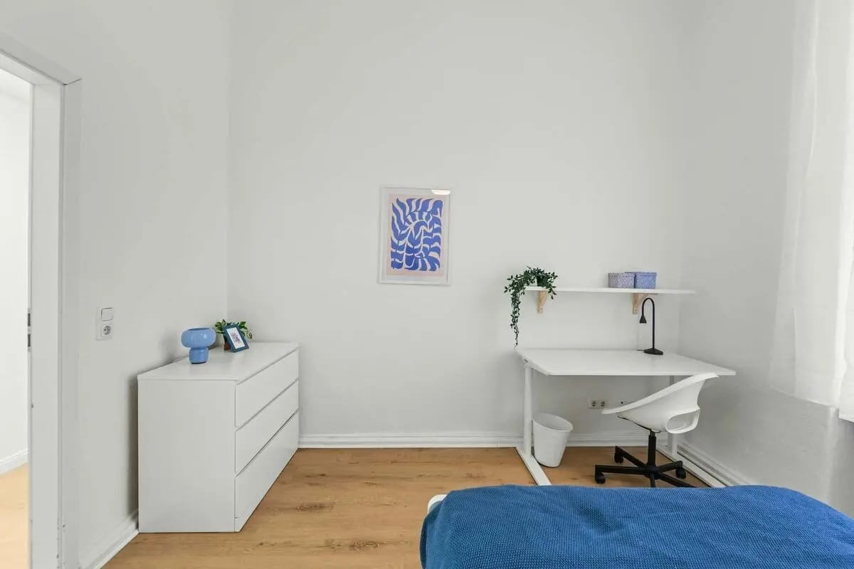 White dresser art desk with lamp bedroom. at Room in Münchener Str., 10779 Berlin-Bezirk Tempelhof-Schöneberg, Germany in Berlin Student Accommodation