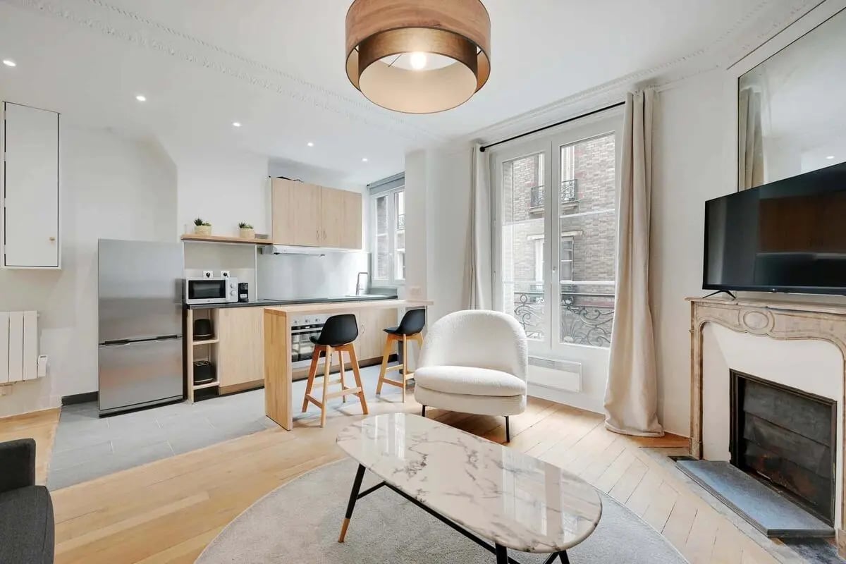 Modern studio apartment with kitchen and living area at Studio in 47 Rue Nollet, 75017 Paris, France in Paris Student Accommodation