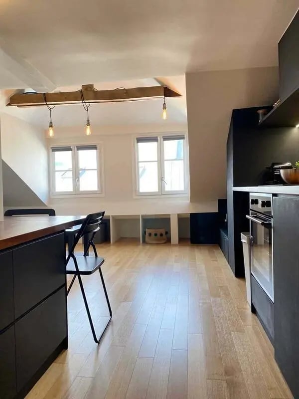 Modern kitchen with island oven and chairs kitchen at Studio in 19 Rue Mazarine, 75006 Paris, France in Paris Student Accommodation