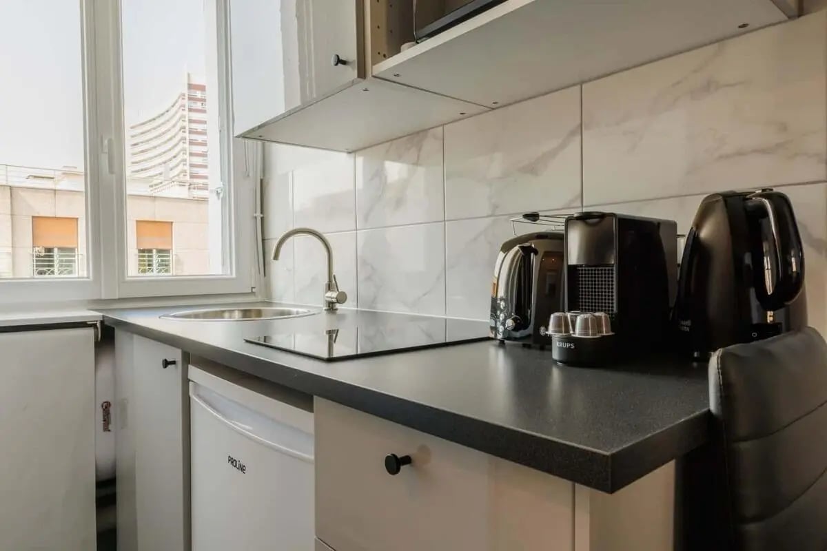 Sink toaster coffee maker kettle kitchen at Studio in 9 Rue de la Convention, 75015 Paris, France in Paris Student Accommodation
