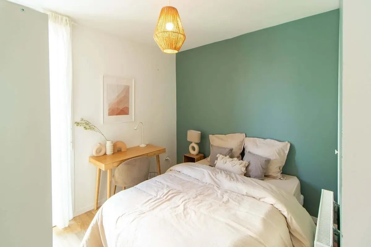 Bed desk chair pillows and art Bedroom at Room in 58 Rue Cesária Évora, 75019 Paris, France in Paris Student Accommodation