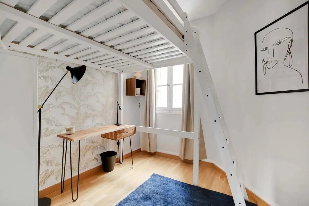 Loft bed desk lamp and art bedroom at Room in 1 Rue François Mouthon, 75015 Paris, France in Paris Student Accommodation