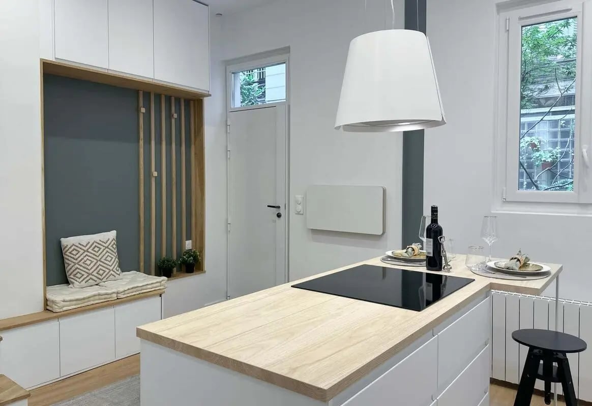 Kitchen island with hob and seating kitchen at Studio in Rue Cadet, 75009 Paris, France in Paris Student Accommodation