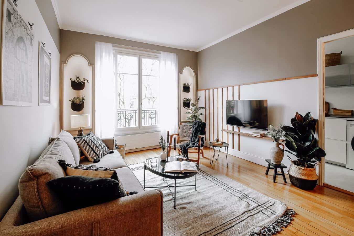 Sofa rug coffee table chair television living room at Apartment in 35 Av. de Versailles, 75016 Paris, France in Paris Student Accommodation