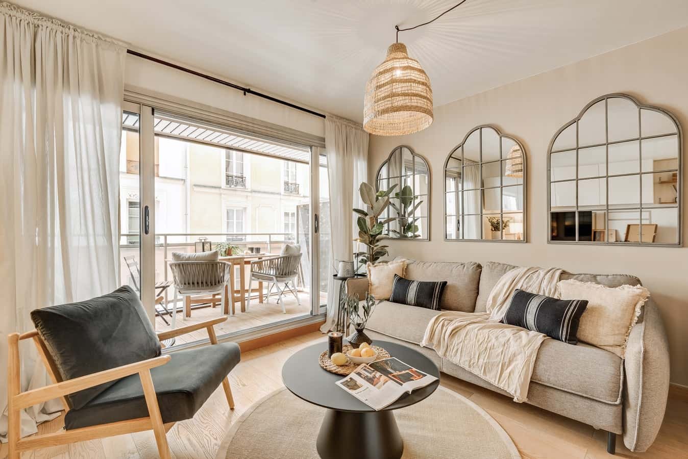 Sofa armchair coffee table with objects living room at Apartment in 7 Rue Augereau, 75007 Paris, France in Paris Student Accommodation