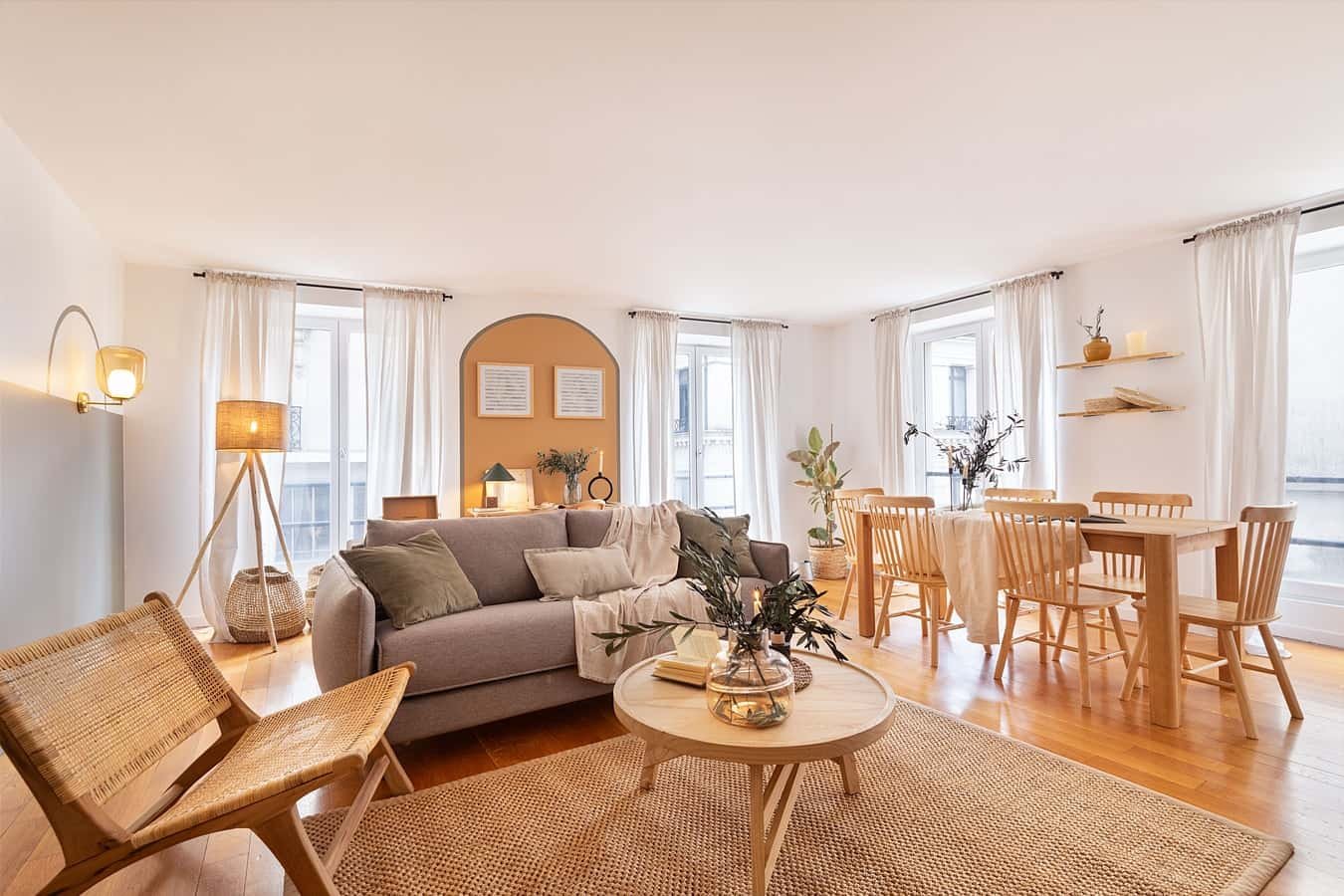 Sofa dining table chairs rug living room at Apartment in 31 Bd de Bonne Nouvelle, 75002 Paris, France in Paris Student Accommodation