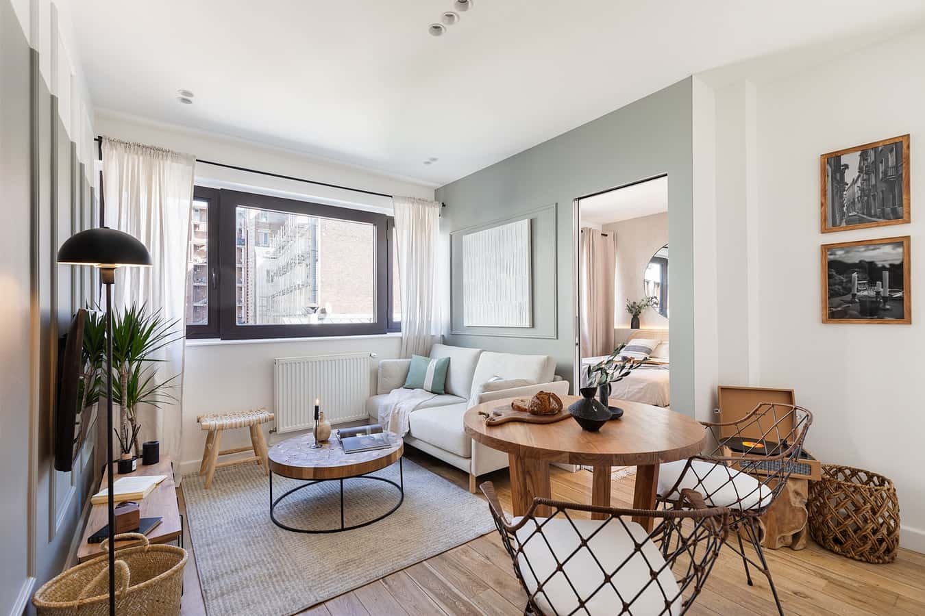 Sofa coffee table dining table chairs interior living room at Apartment in 42 Av. de Versailles, 75016 Paris, France in Paris Student Accommodation