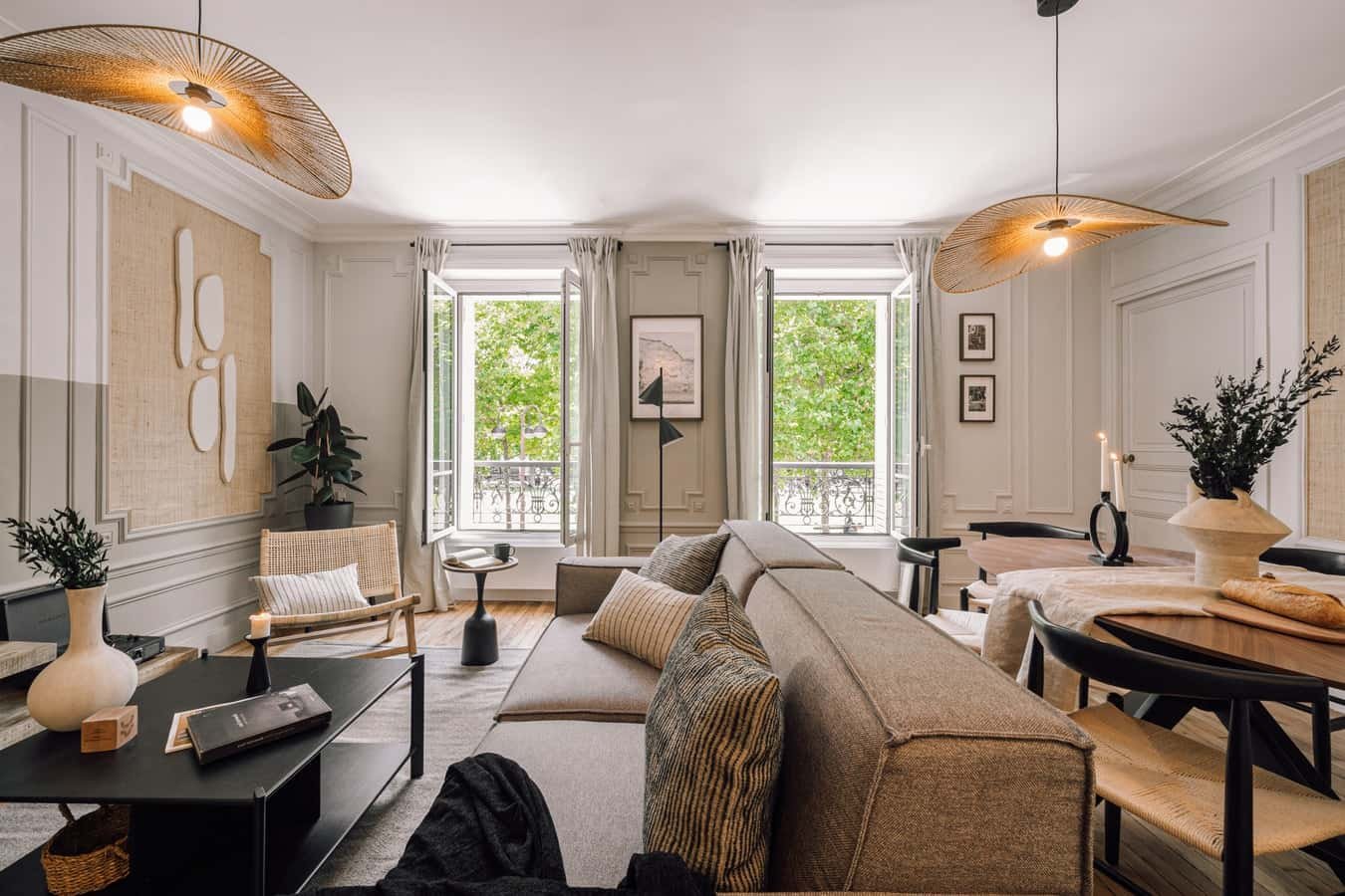 Sofa dining table chairs and plant living room at Apartment in 74 Av. de Breteuil, 75007 Paris, France in Paris Student Accommodation