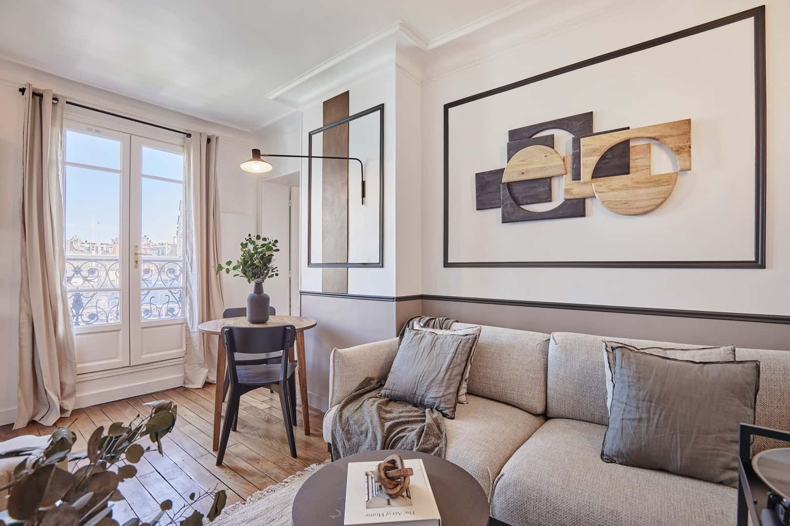 Sofa artwork chairs and table living room at Apartment in 150 Bd de Grenelle, 75015 Paris, France in Paris Student Accommodation