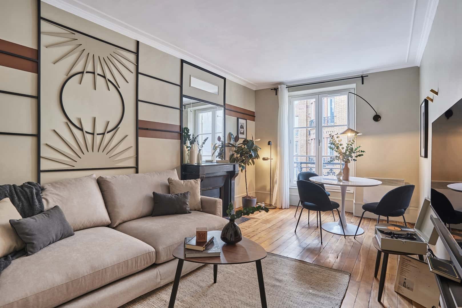 Sofa fireplace table and chairs living room at Apartment in 56 Rue de Babylone, 75007 Paris, France in Paris Student Accommodation