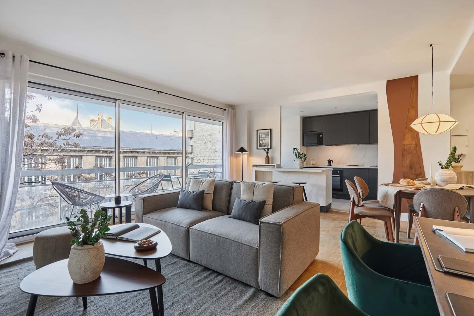 Sofa kitchen dining area balcony living room at Apartment in 187 Rue de Vaugirard, 75015 Paris, France in Paris Student Accommodation