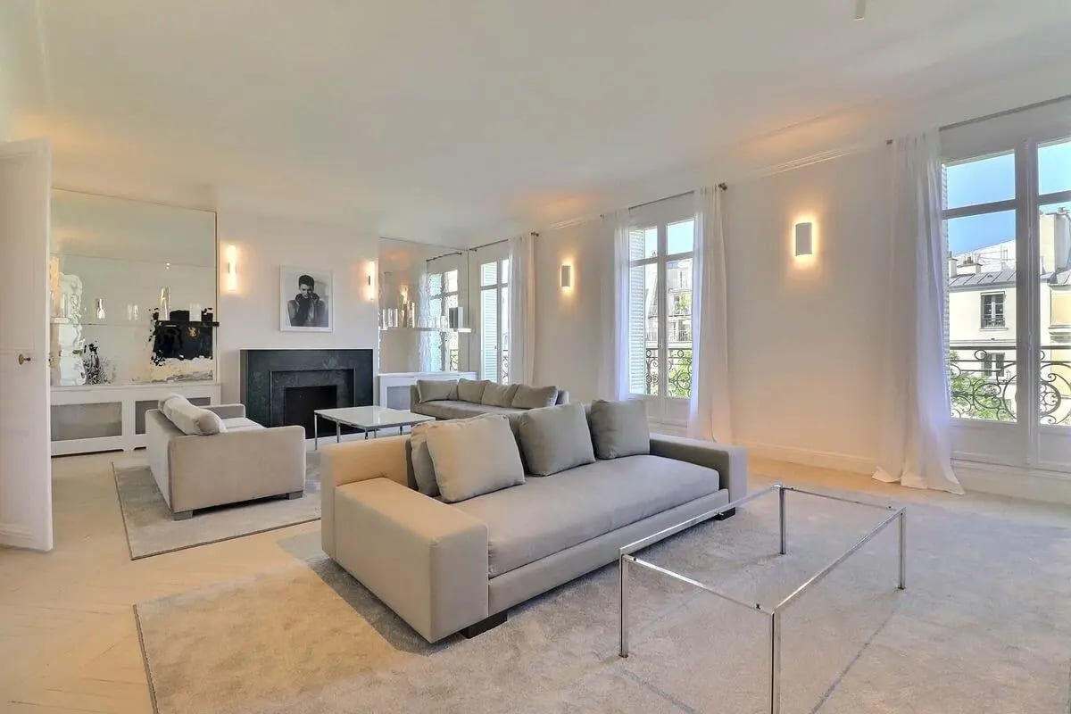 Three sofas fireplace mirrors art living room at Apartment in Bd Saint-Germain, 75006 Paris, France in Paris Student Accommodation