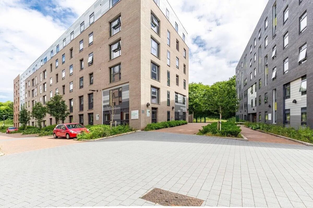 Modern apartment buildings with red car exterior at Marshall Court in Newcastle Upon Tyne Student Accommodation