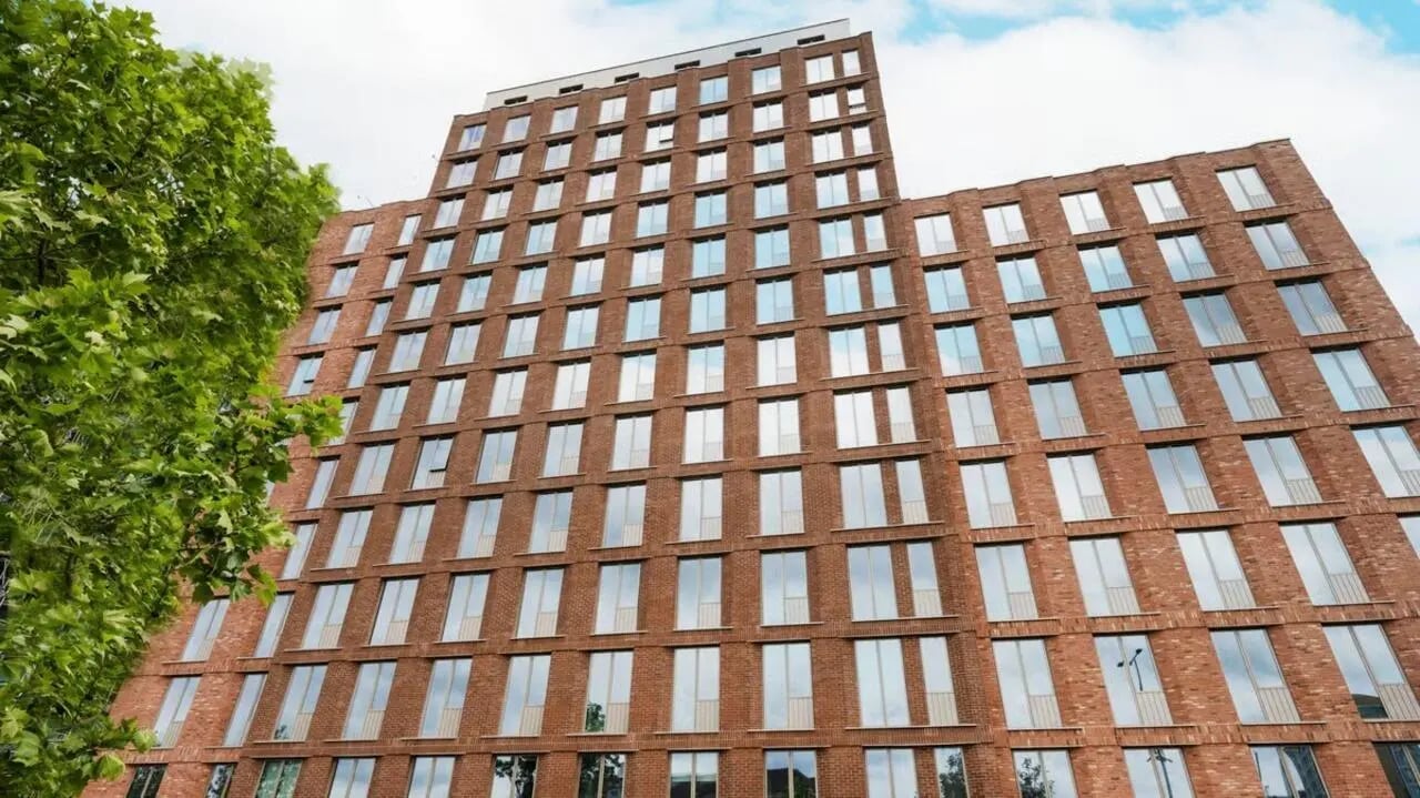 Red brick student accommodation building with many windows Exterior at Press House in London Student Accommodation