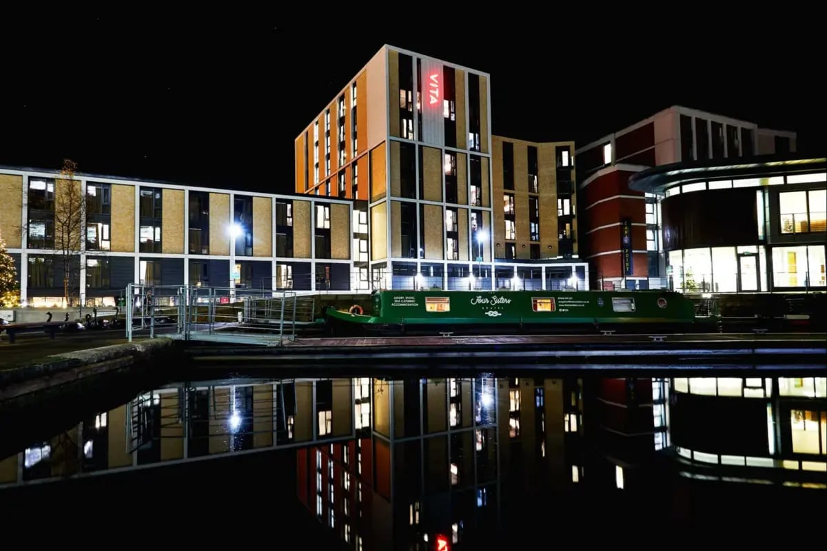 Modern student accommodation buildings and canal boat exterior at Vita Student Fountainbridge - Edinburgh in Edinburgh Student Accommodation