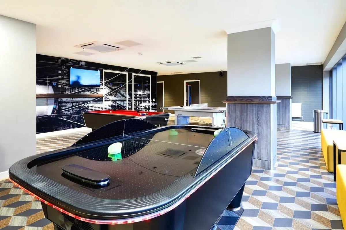 Air hockey and pool tables playing area at Vita Student West End - Glasgow in Glasgow Student Accommodation