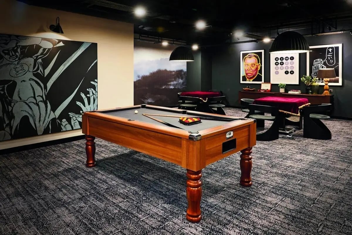 Pool table artwork and seating area playing area at Vita Student Portland Crescent in Leeds Student Accommodation