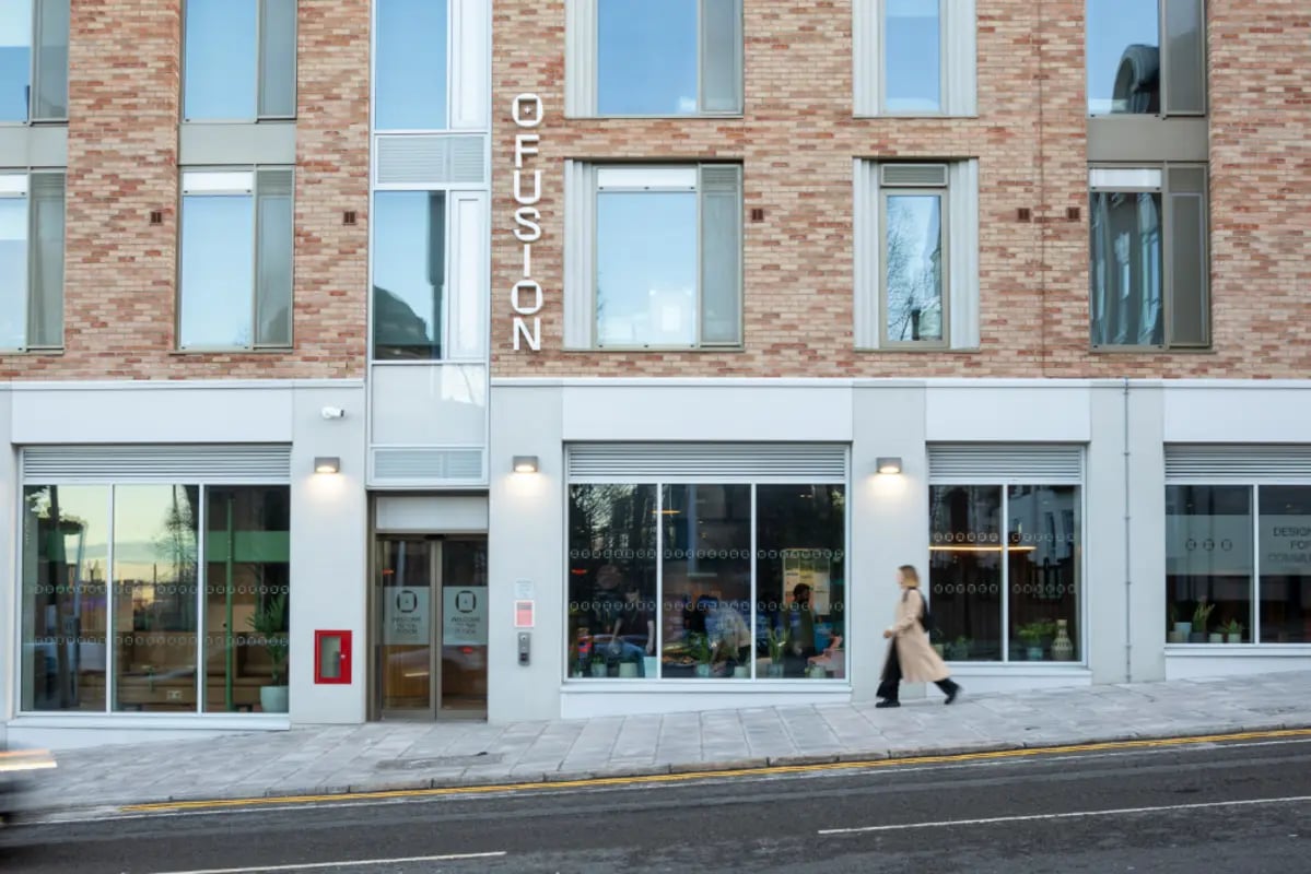 Building exterior with name Ofusion and large windows Exterior at Fusion Students Liverpool in Liverpool Student Accommodation