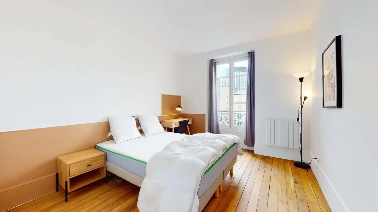 Bed desk lamp and painting bedroom at Room in 43 Bd Garibaldi, 75015 Paris, France in Paris Student Accommodation