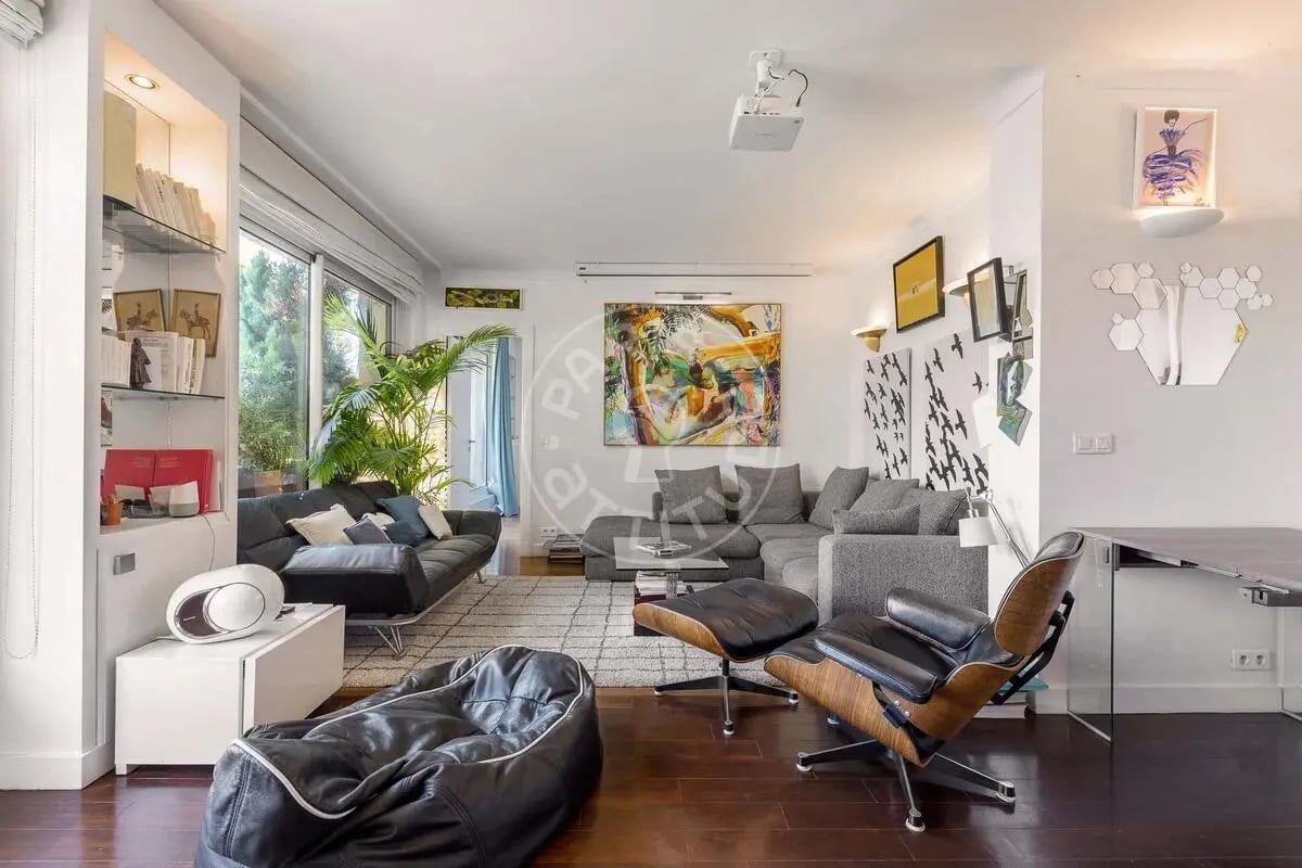 Stylish living room with sofa and chairs living room at Apartment in Quai Louis Blériot, 75016 Paris, France in Paris Student Accommodation