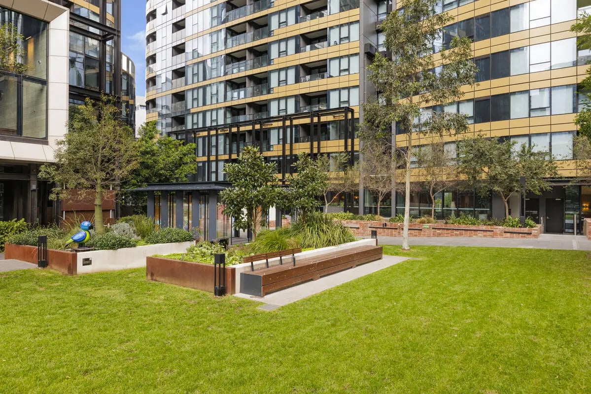 Bird sculpture bench and building exterior at West Tower, Melbourne Quarter in Melbourne Student Accommodation