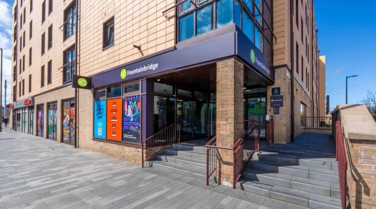 Fountainbridge building exterior with large windows and stairs exterior at iQ Fountainbridge in Edinburgh Student Accommodation