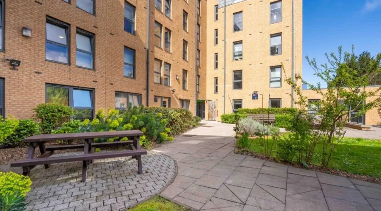 Picnic table and benches exterior at iQ Grove in Edinburgh Student Accommodation
