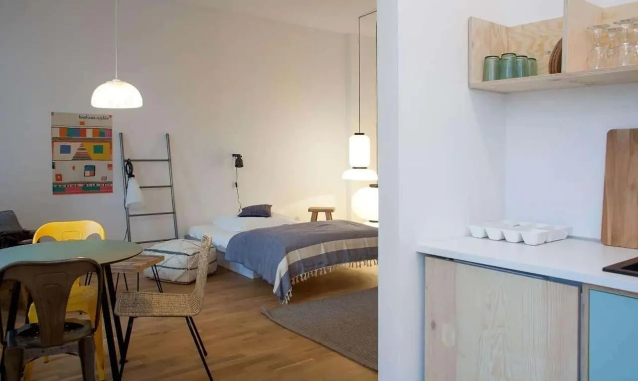 Bed dining area and kitchen area studio apartment at Studio for rent in Berlin, bills included in Berlin Student Accommodation