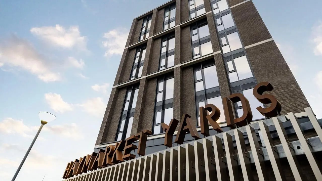Building with MARKET YARDS sign exterior at Haymarket Yards in Edinburgh Student Accommodation
