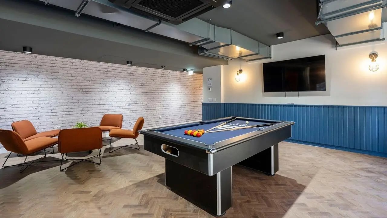 Pool table chairs television playing area at Clyde Court in Glasgow Student Accommodation