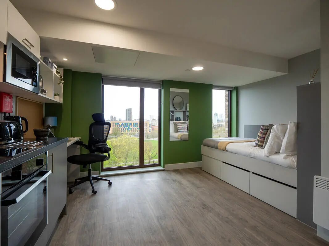 Kitchen desk bed and view Student accommodation room at Venue Studios in London Student Accommodation