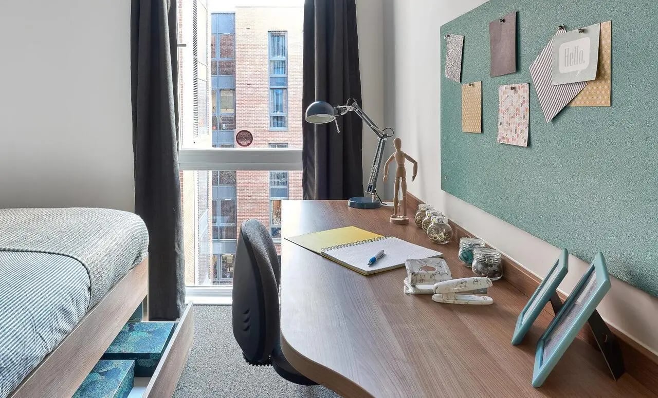 Desk with lamp and bedding study area at The Elements in Sheffield Student Accommodation