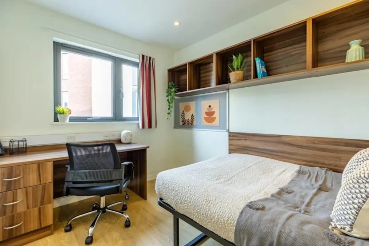 Desk chair shelves bed artwork room at The Printworks in Exeter Student Accommodation