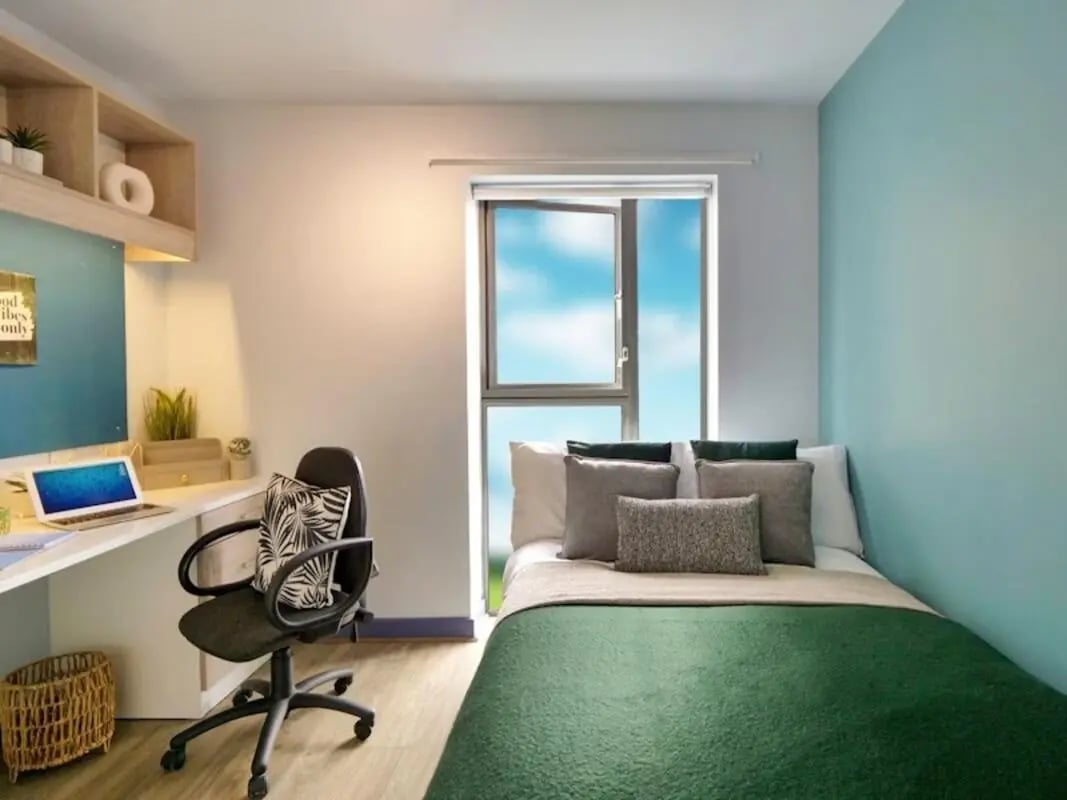 Desk laptop chair bed and window bedroom at Bright House in Kingston Upon Thames Student Accommodation