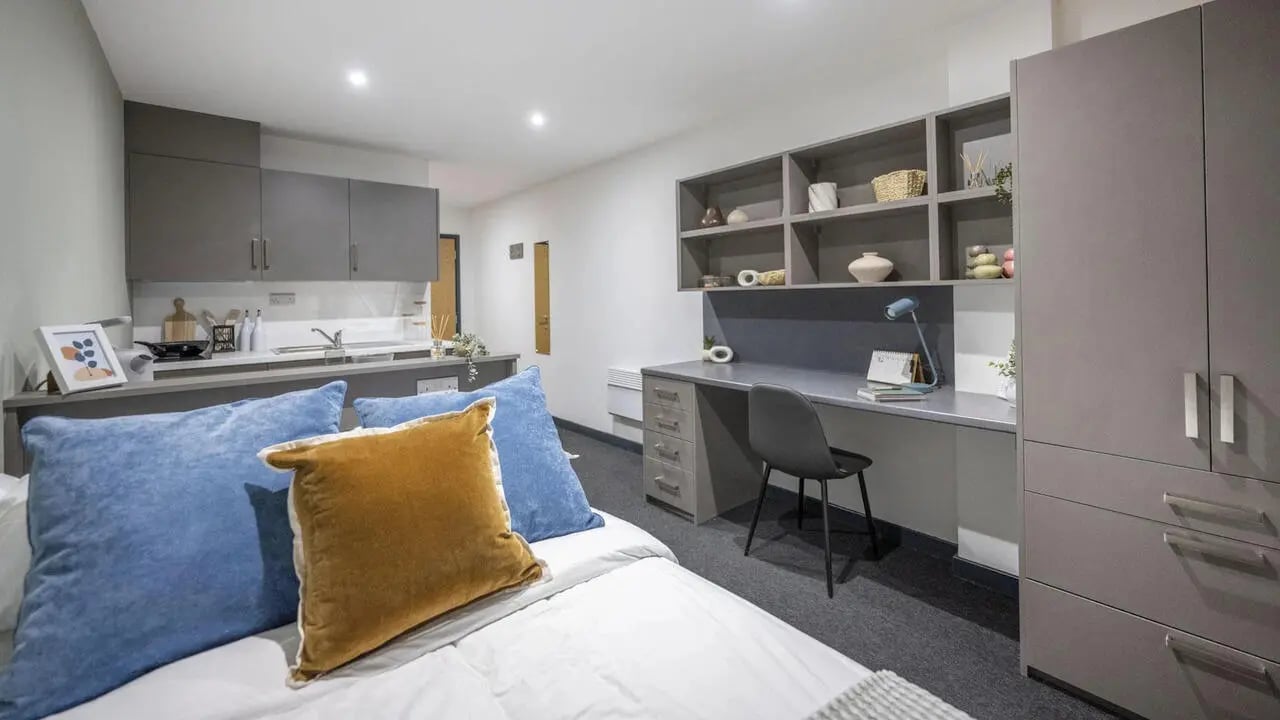 Bed study area kitchen and desk Bedroom at Icon House in Stoke-On-Trent Student Accommodation