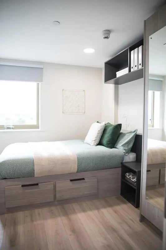 Bed with drawers and pillows bedroom at Stanley Studios in Southampton Student Accommodation