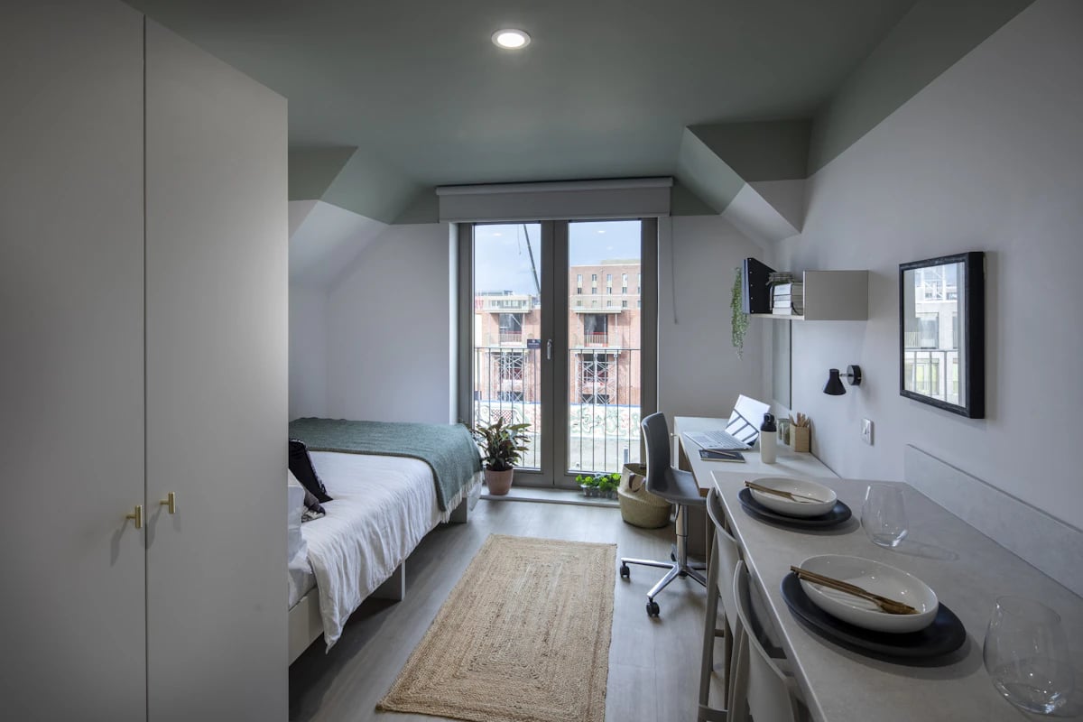 Bed desk dining area with views interior at The Keel Houses in Edinburgh Student Accommodation