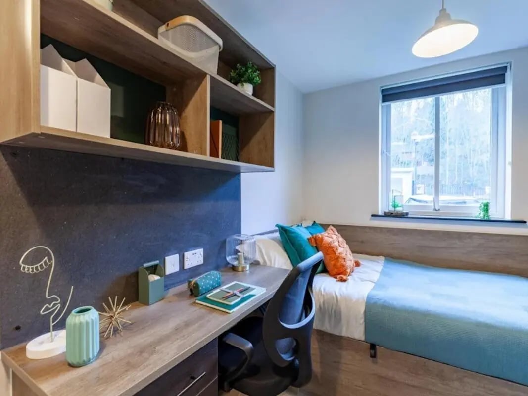 Bed desk shelving and chair bedroom at The Leather Works in Leeds Student Accommodation