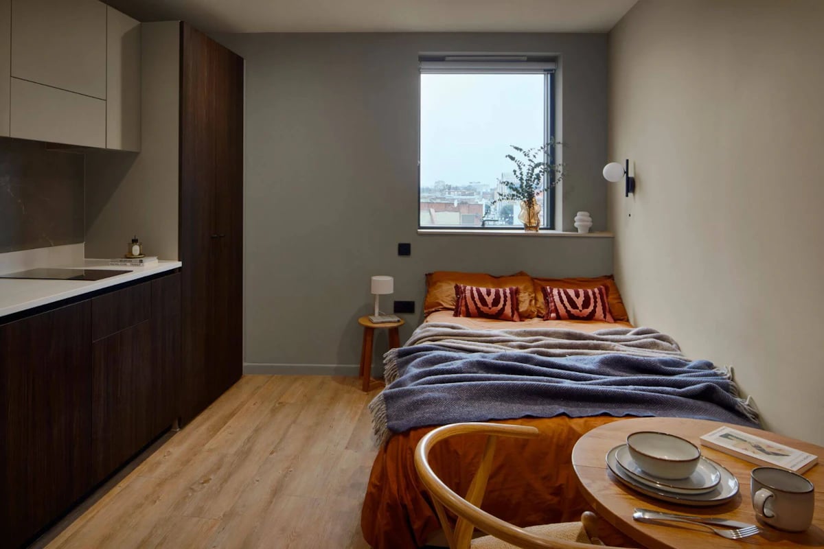 Bed kitchen desk and chair bedroom at Tribu Kingston in Kingston Upon Thames Student Accommodation