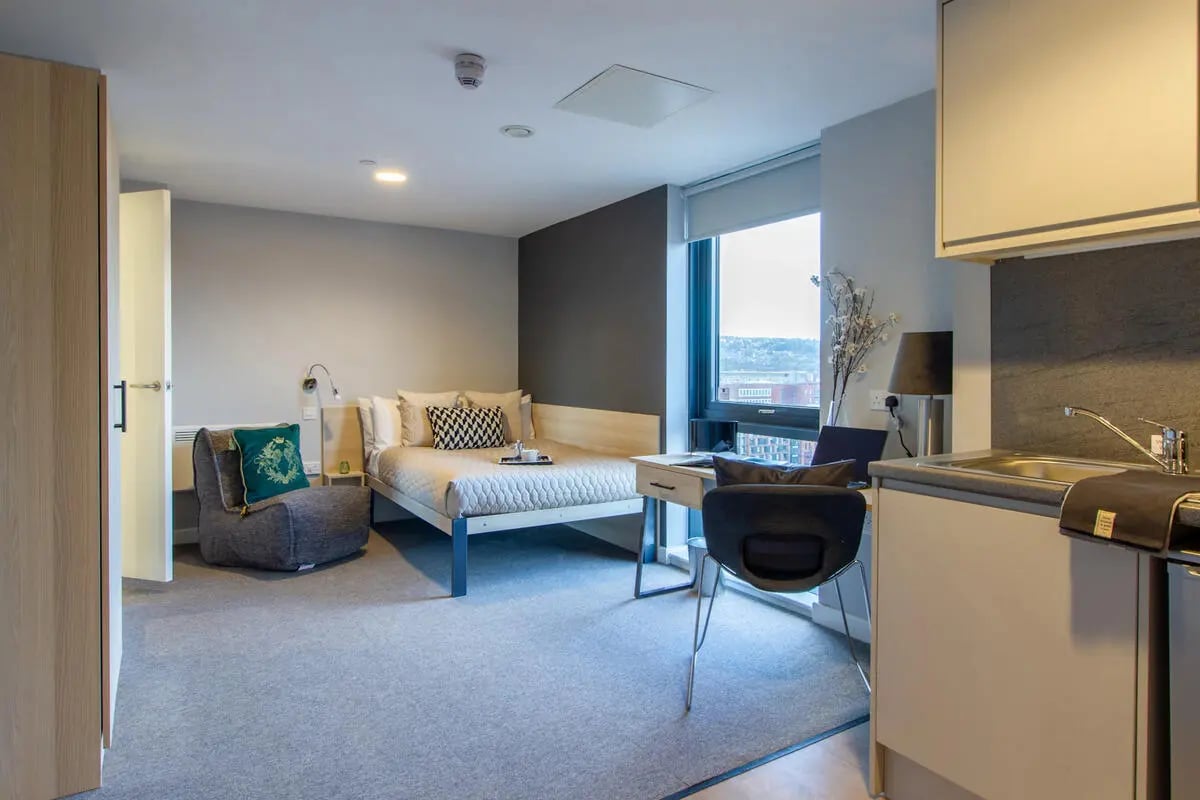 Bed beanbag chair desk sink kitchen studio at Straits Manor in Sheffield Student Accommodation